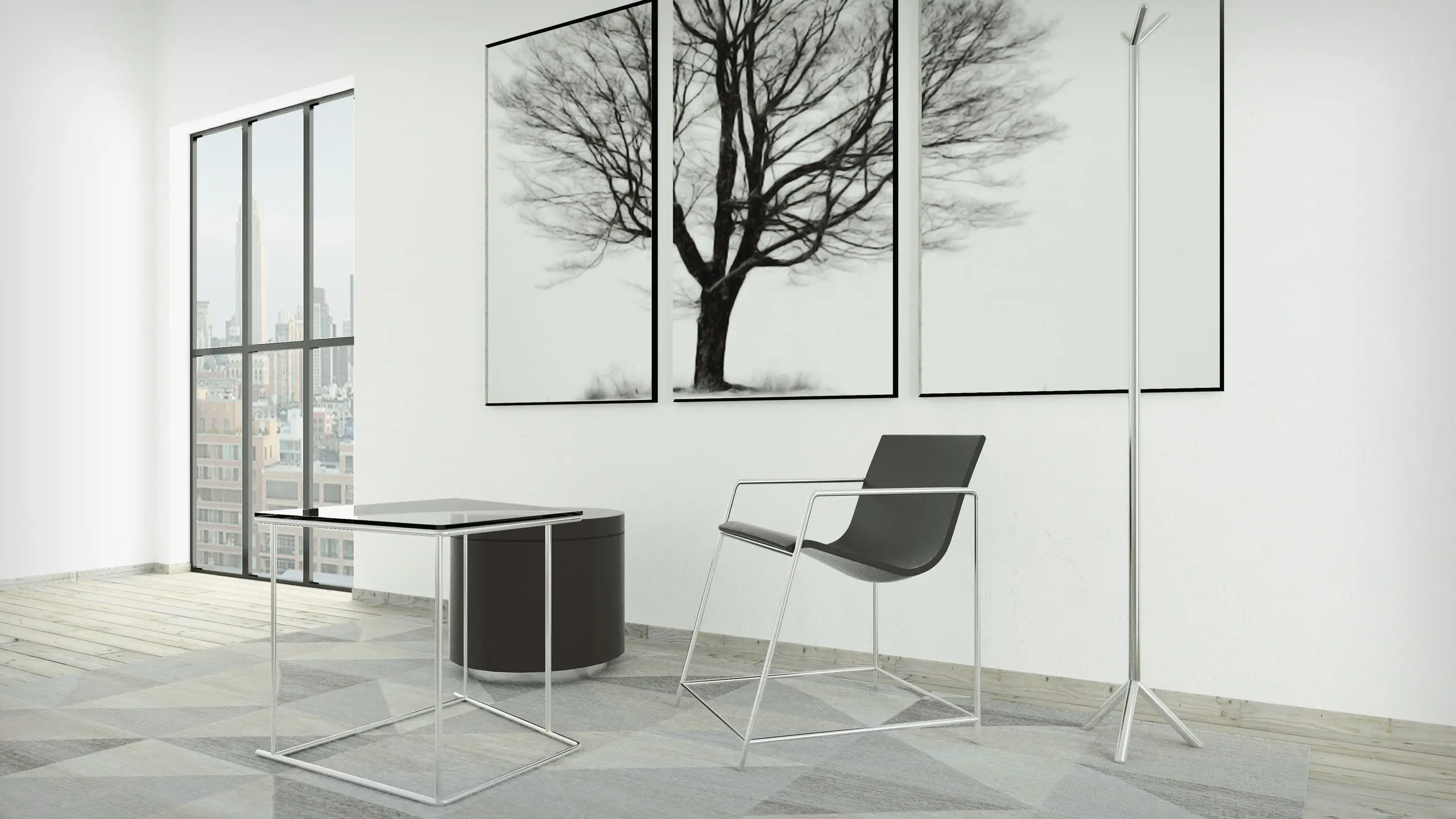 A slender steel-framed chair, a drum stool and a leaning mirror in a bare white room, a winter tree beyond the window